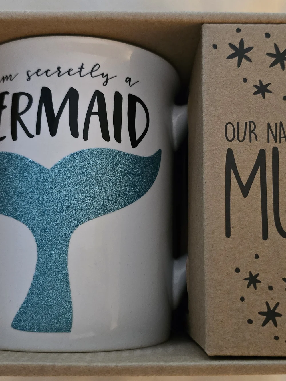 Our Name Is Mud white ceramic